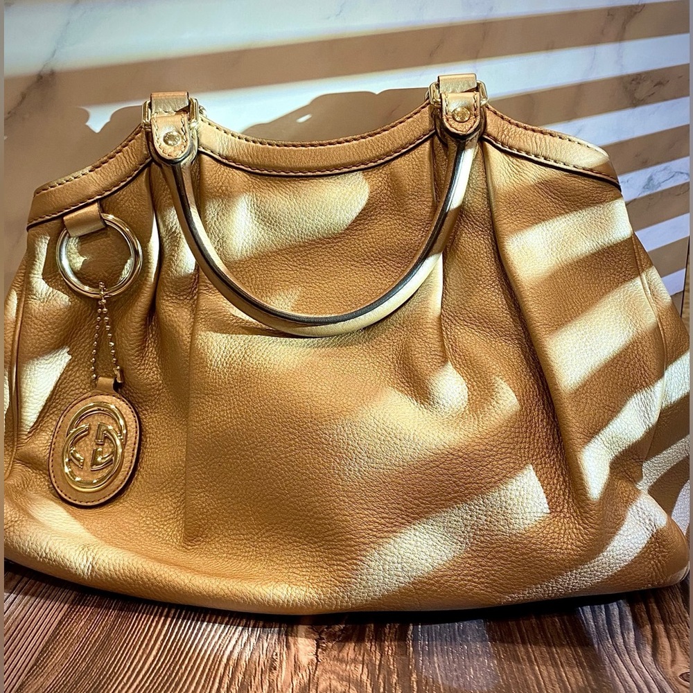 GENTLY USED - GUCCI COWHIDE PEARL POWDER BAGS